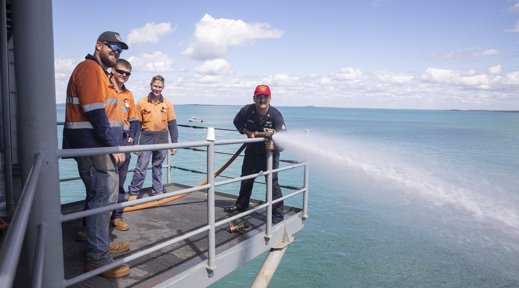 Industrial workers on an offshore energy facility
